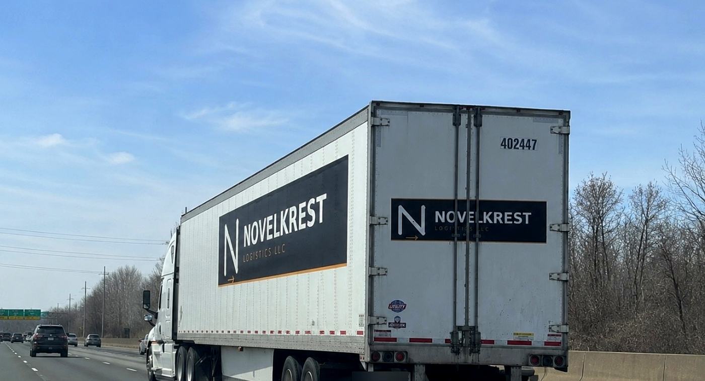 Novelkrest Logistics branded semi truck on the road
